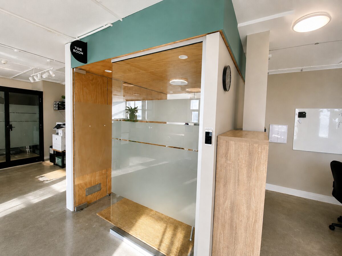 Tide Room meeting pod and signage inside Lyall Bay WorkHub Wellington