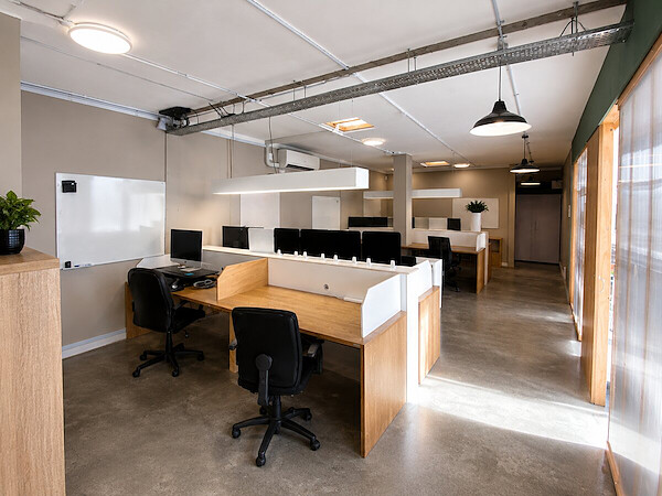 Open plan coworking desks at Lyall Bay WorkHub Wellington
