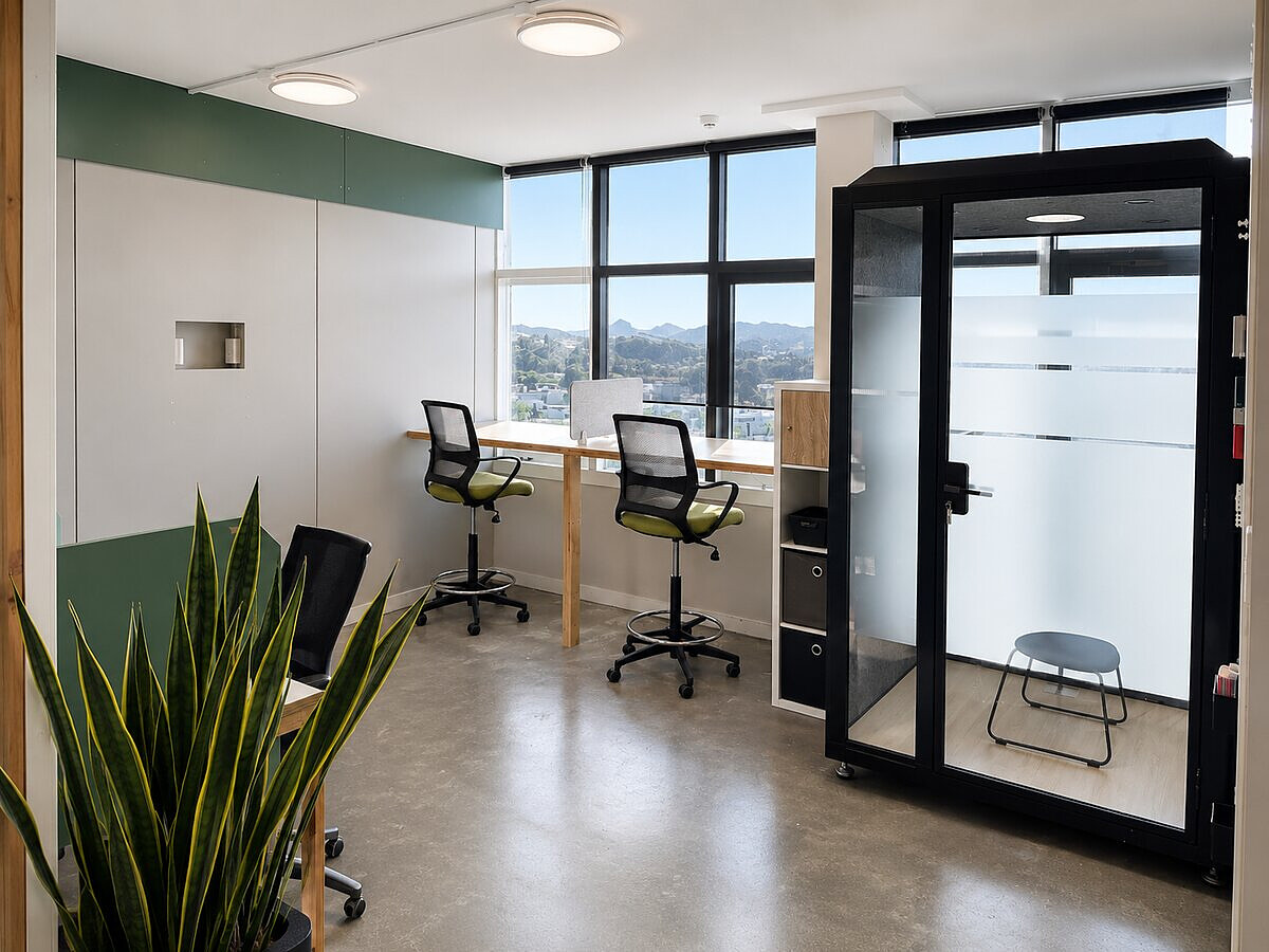 Private phone booth and desks at Lyall Bay WorkHub Wellington